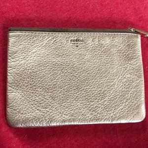 Gold, leather Fossil zip pouch.